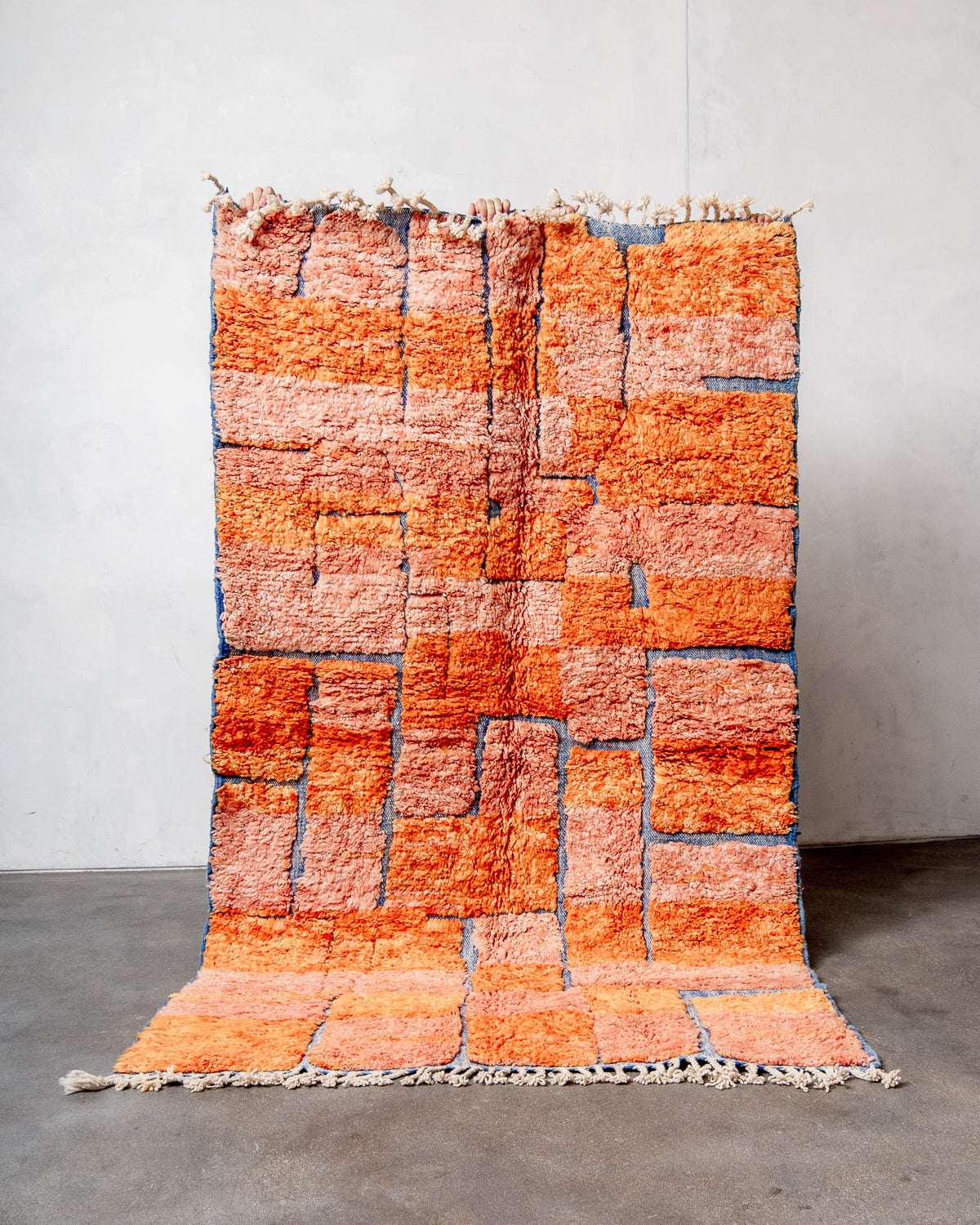 Modern, designer, handcrafted Berber rug from Morocco. Beniourain carpet with beautiful colours and patterns and fluffy wool texture.